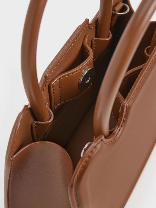 CHARLES & KEITH 
Perline Sculptural Top Handle Bag - Chocolate - Image 7
